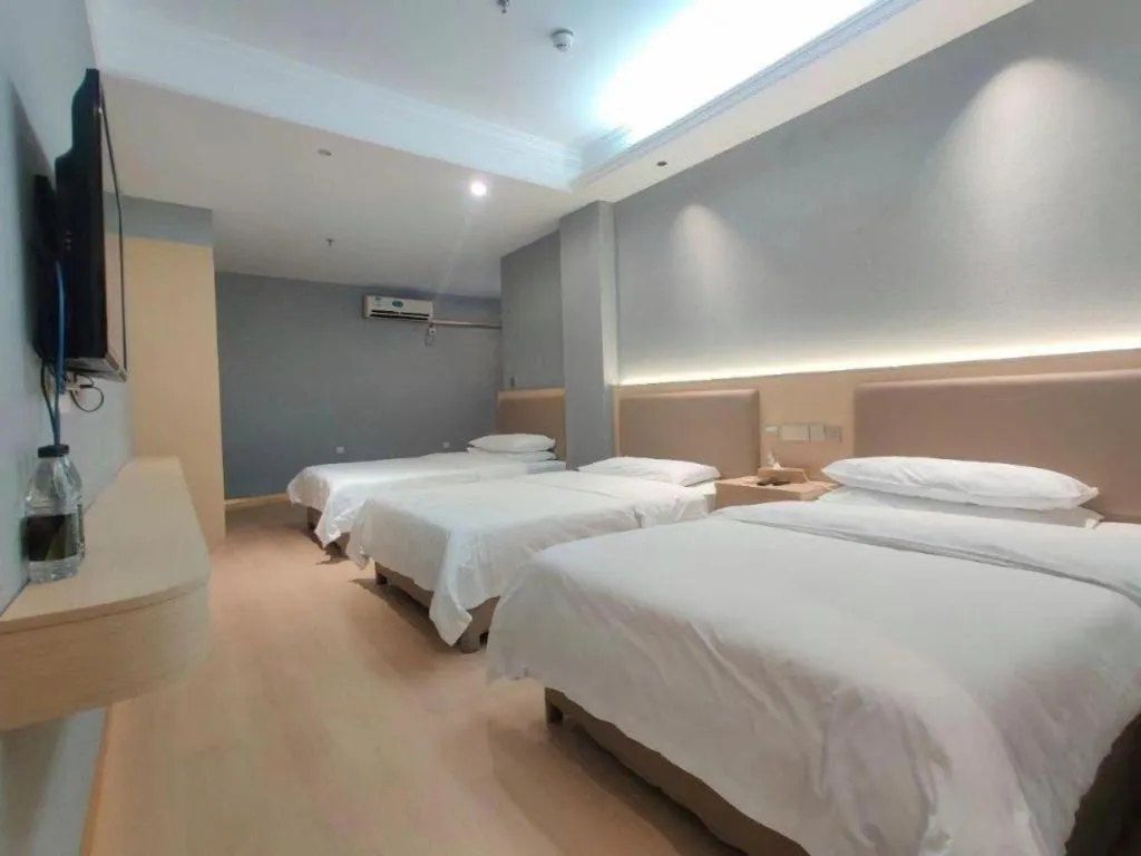 Bed in Vienna Hotel Nanning Train Station