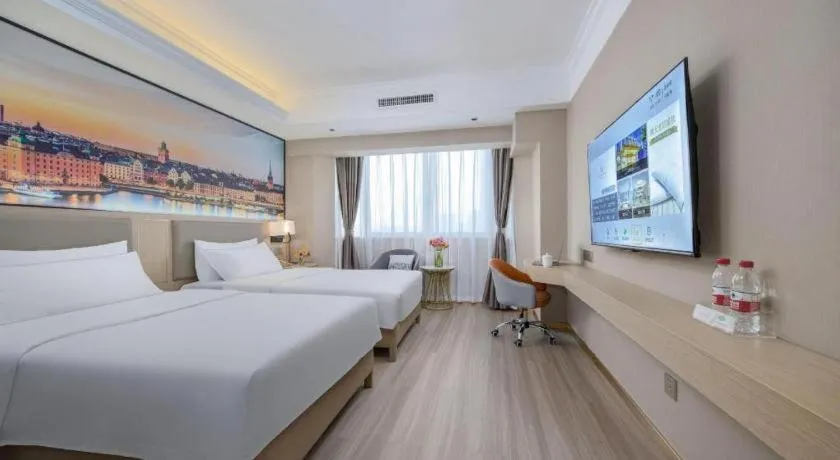 Bed in Vienna Hotel Nanning Train Station