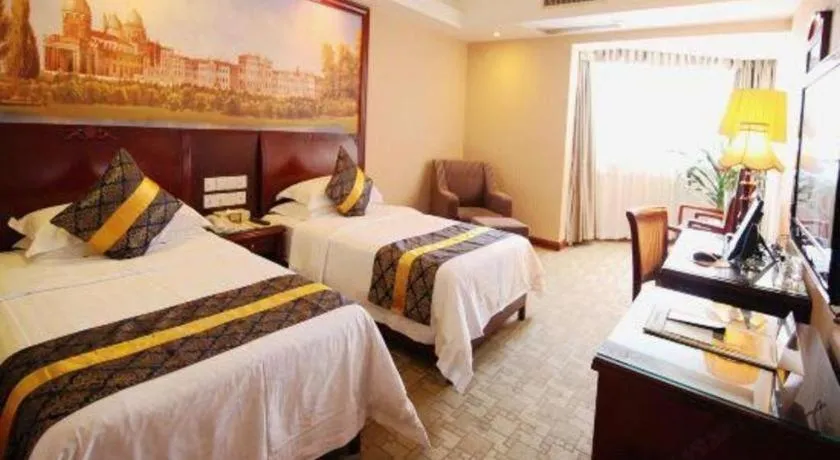 Bed in Vienna Hotel Nanning Train Station