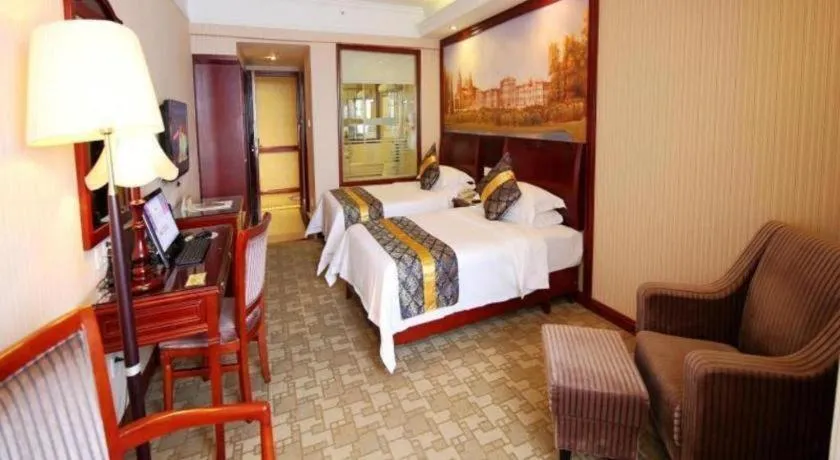 Bed in Vienna Hotel Nanning Train Station