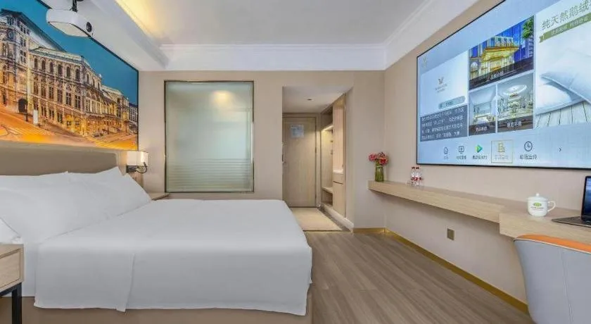 Bed in Vienna Hotel Nanning Train Station