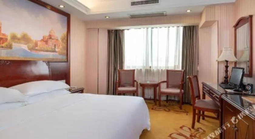 Bed in Vienna Hotel Nanning Train Station