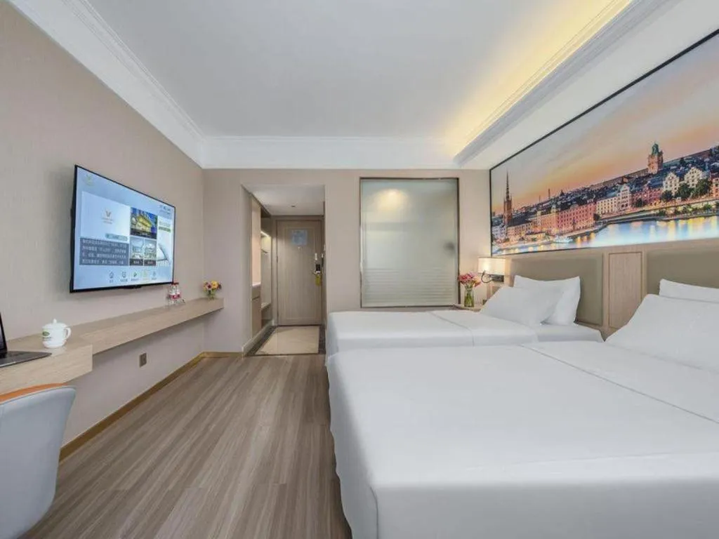 Bed in Vienna Hotel Nanning Train Station