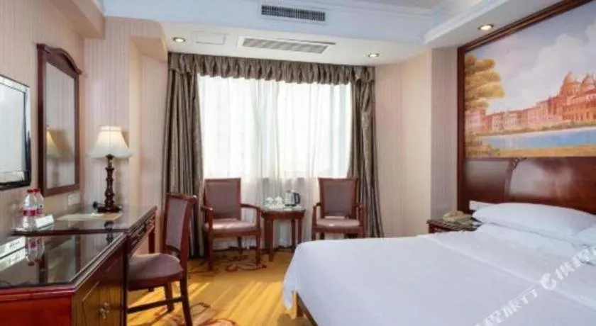 Bed in Vienna Hotel Nanning Train Station