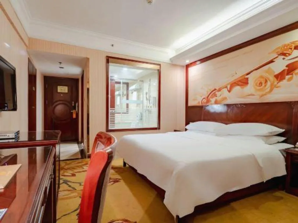 Bed in Vienna Hotel Nanning Train Station