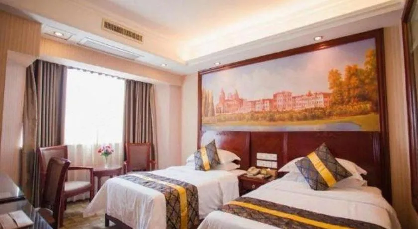 Bed in Vienna Hotel Nanning Train Station