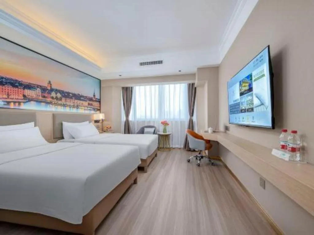 Bed in Vienna Hotel Nanning Train Station