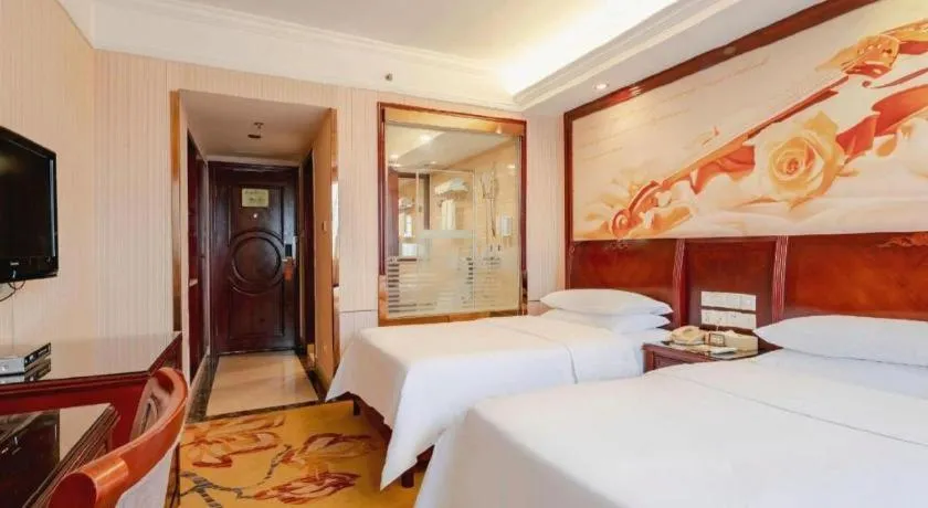 Bed in Vienna Hotel Nanning Train Station