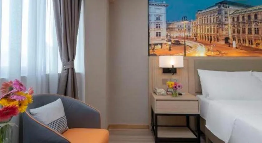 Bed in Vienna Hotel Nanning Train Station