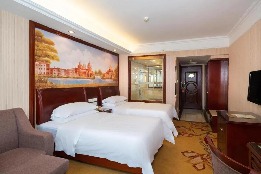 Bed in Vienna Hotel Nanning Train Station