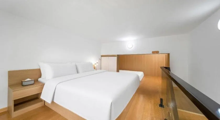 Bed in Vienna Hotel Nanning Train Station