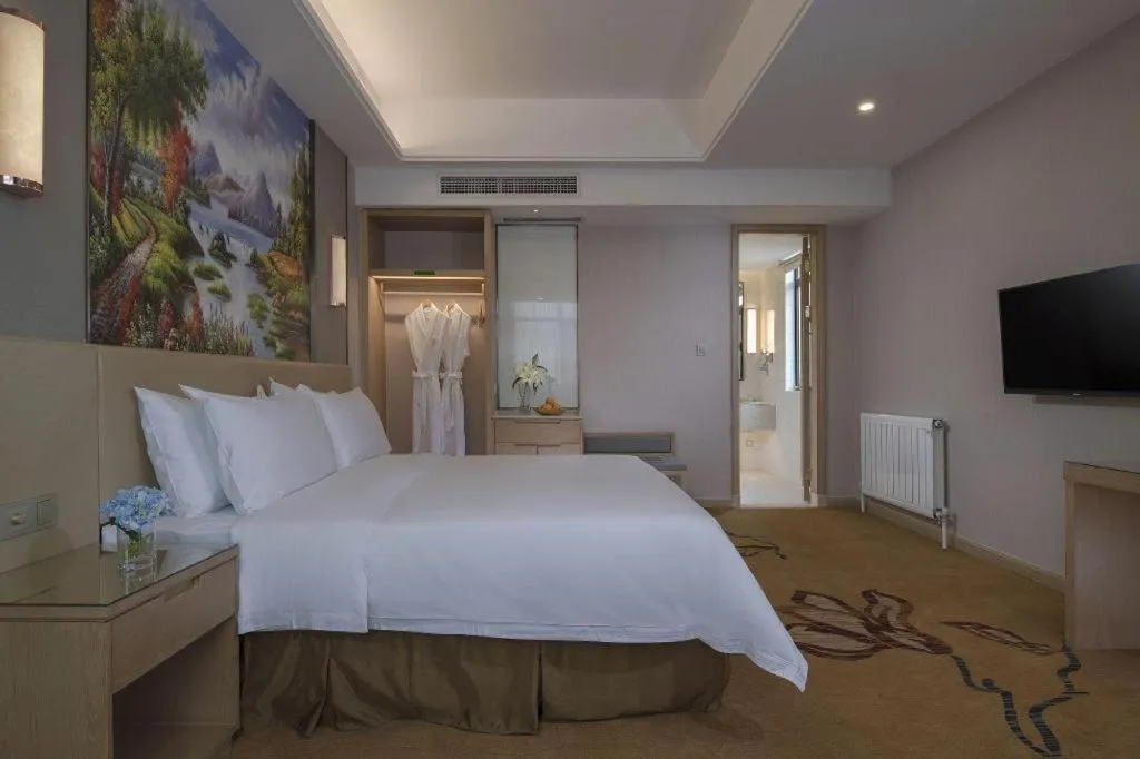 Bed in Vienna Hotel Nanning Train Station