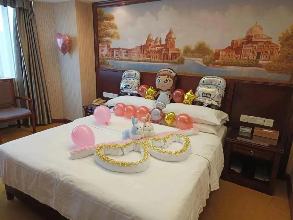 Bed in Vienna Hotel Nanning Train Station