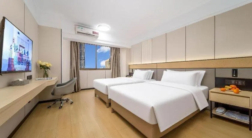 Bed in Vienna Hotel Nanning Train Station