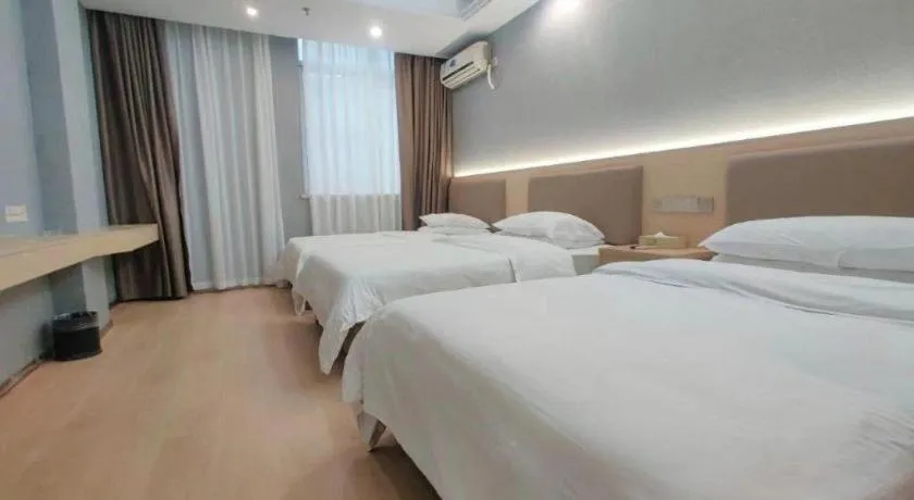 Bed in Vienna Hotel Nanning Train Station