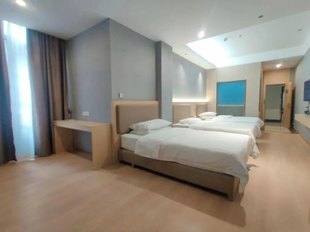 Bed in Vienna Hotel Nanning Train Station