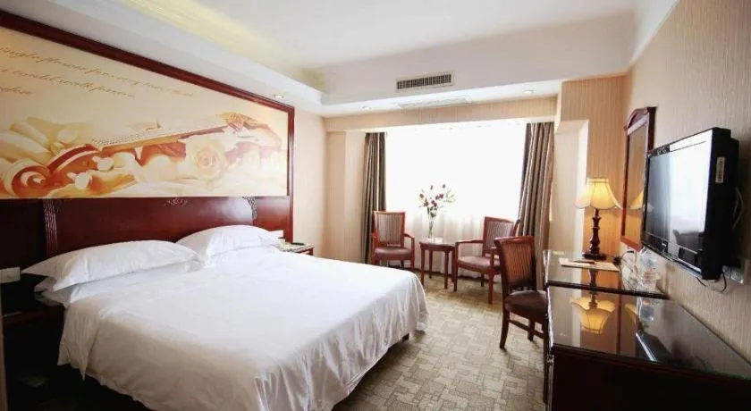 Bed in Vienna Hotel Nanning Train Station