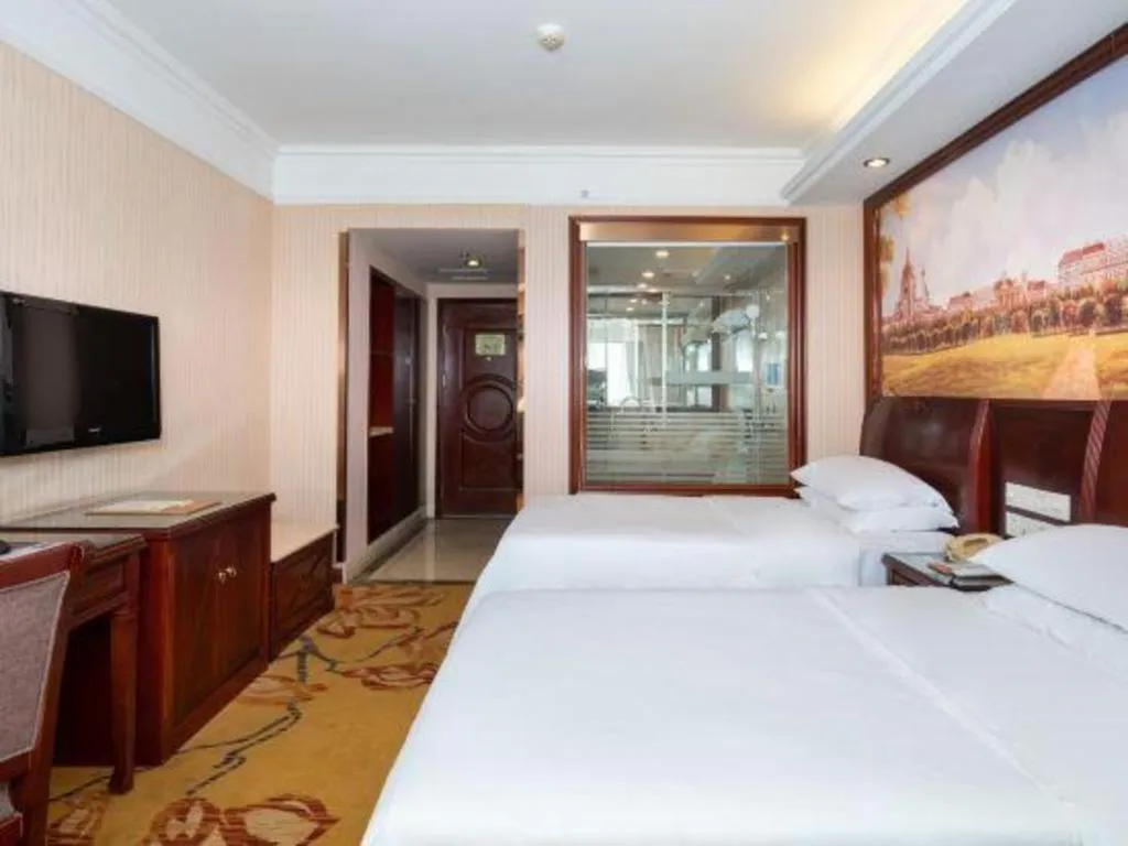 Bed in Vienna Hotel Nanning Train Station