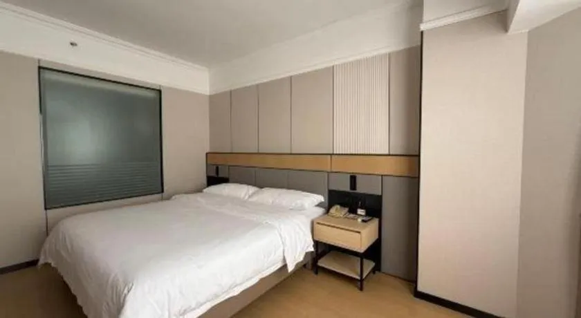 Bed in Vienna Hotel Nanning Train Station