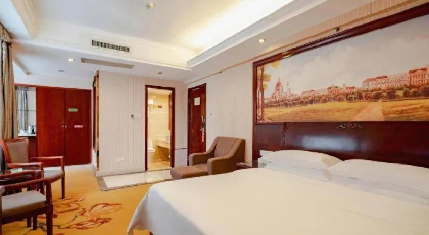 Bed in Vienna Hotel Nanning Train Station