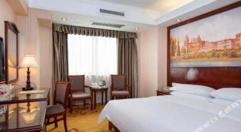 Bed in Vienna Hotel Nanning Train Station