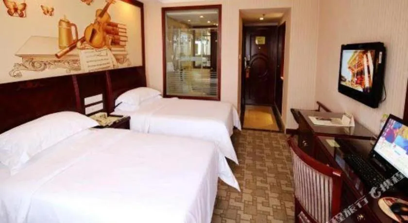 Bed in Vienna Hotel Nanning Train Station