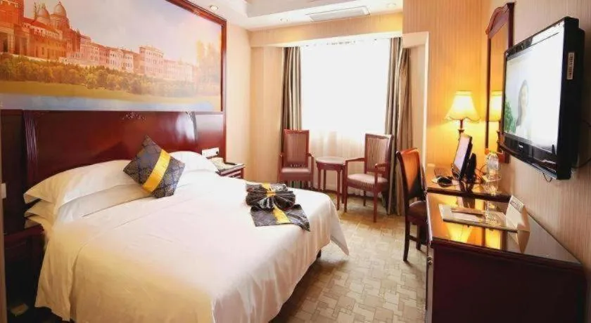 Bed in Vienna Hotel Nanning Train Station