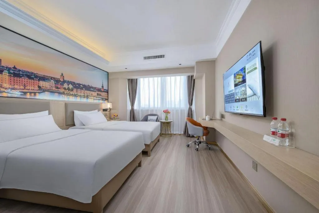 Bed in Vienna Hotel Nanning Train Station