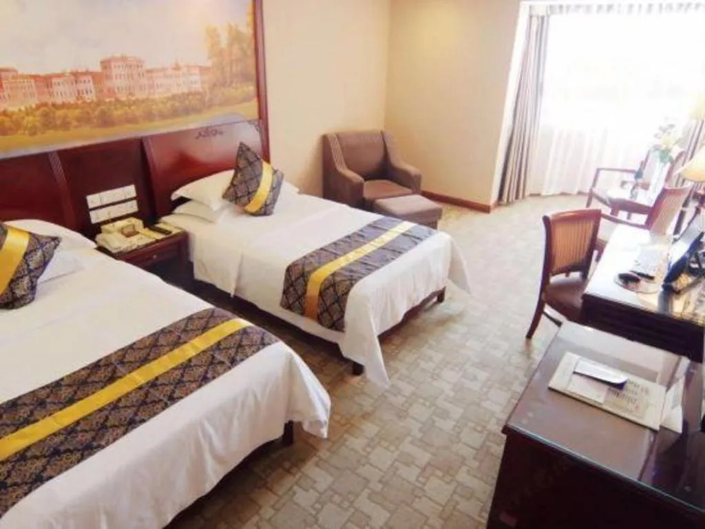 Bed in Vienna Hotel Nanning Train Station