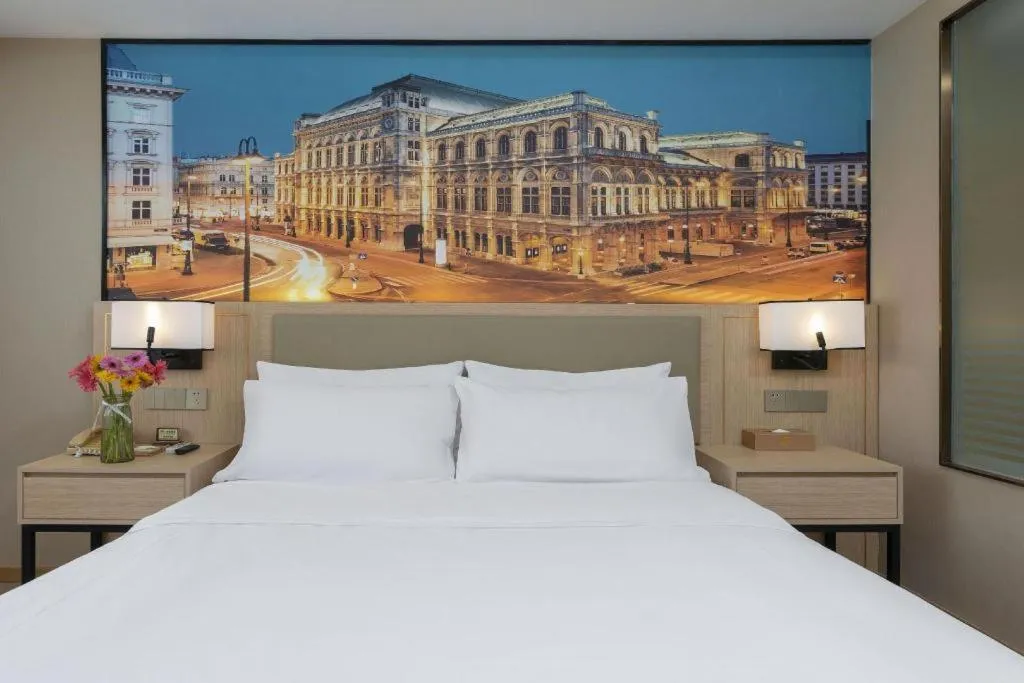 Bed in Vienna Hotel Nanning Train Station