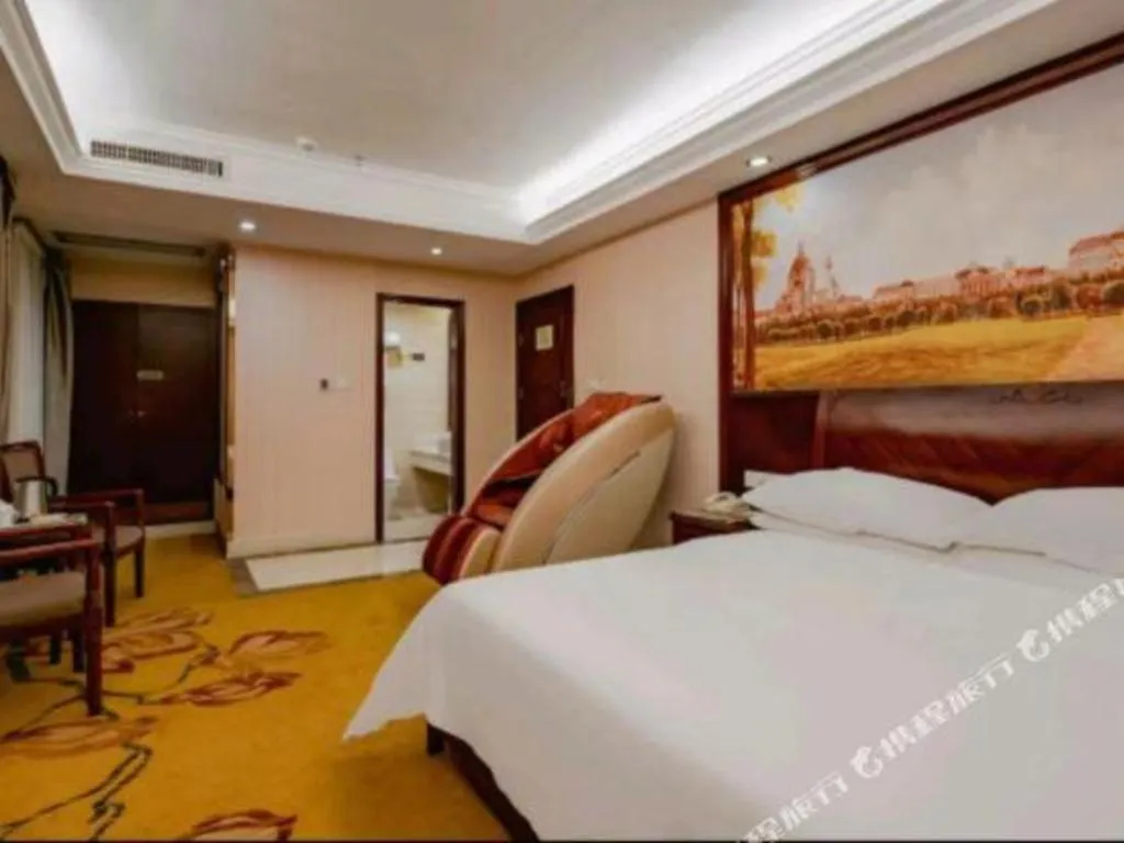 Bed in Vienna Hotel Nanning Train Station