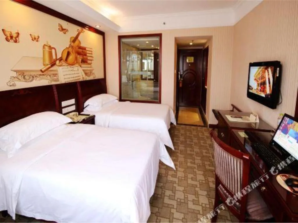 Bed in Vienna Hotel Nanning Train Station