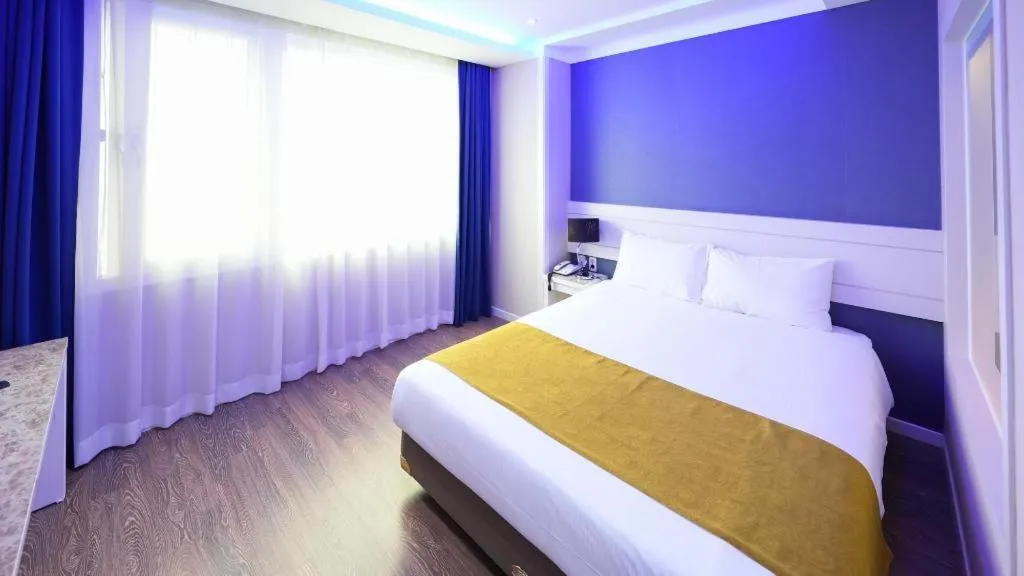Bed in Galaxy Hotel