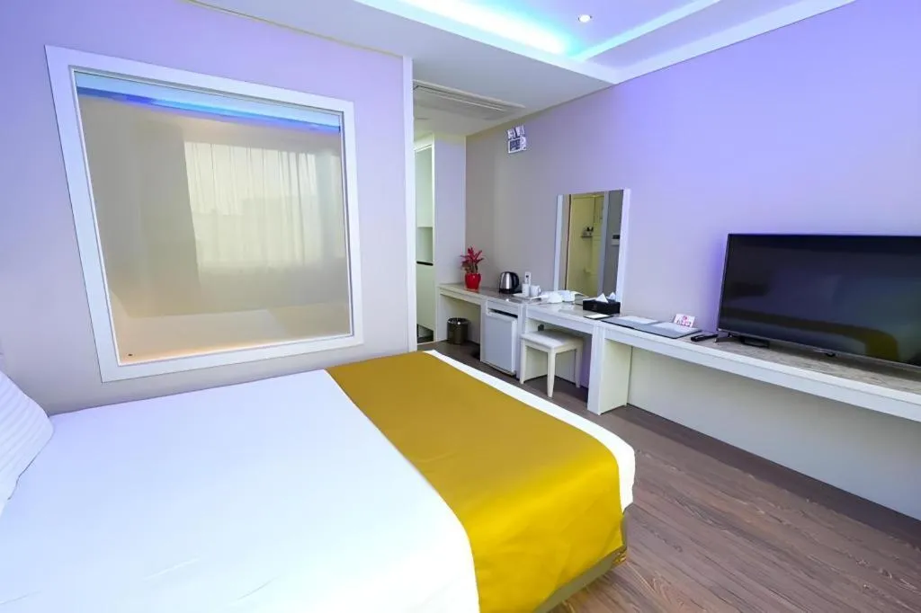 Bed in Galaxy Hotel