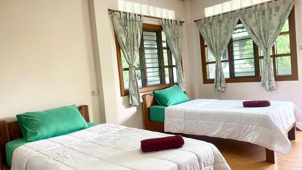 Bed in Phuphan Park Hotel