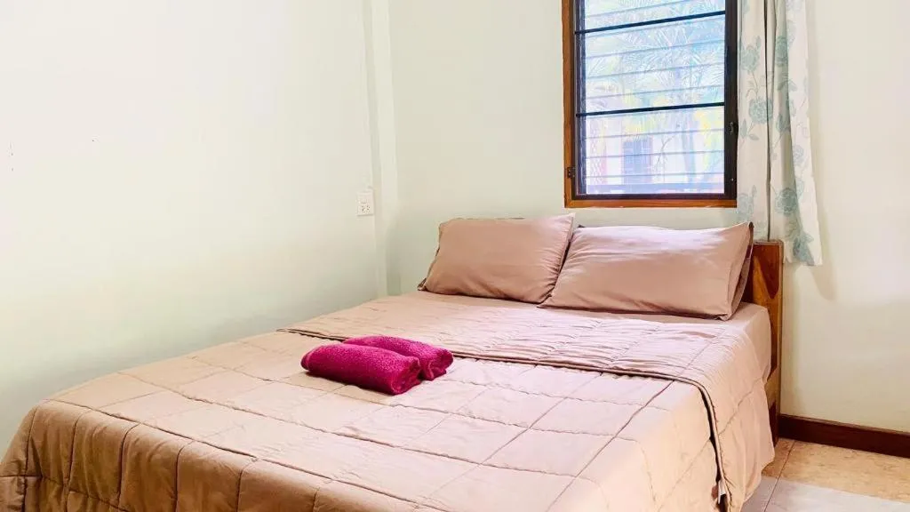 Bed in Phuphan Park Hotel