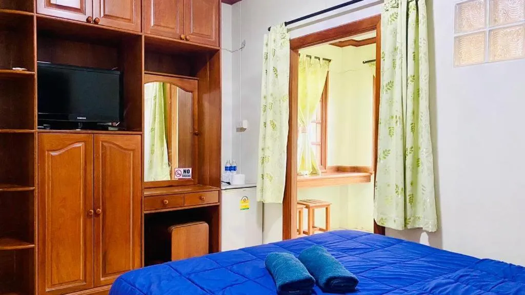 Bed in Phuphan Park Hotel