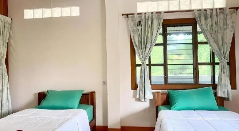 Bed in Phuphan Park Hotel