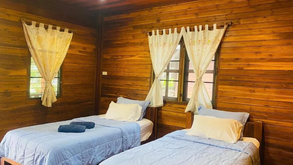 Bed in Phuphan Park Hotel