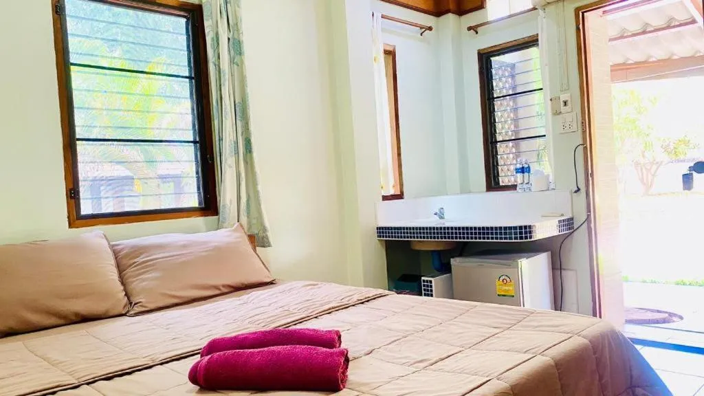 Bed in Phuphan Park Hotel