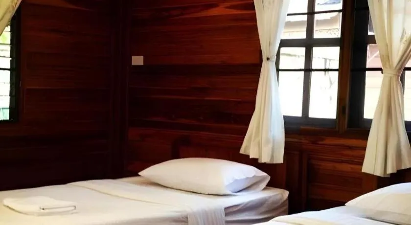 Bed in Phuphan Park Hotel