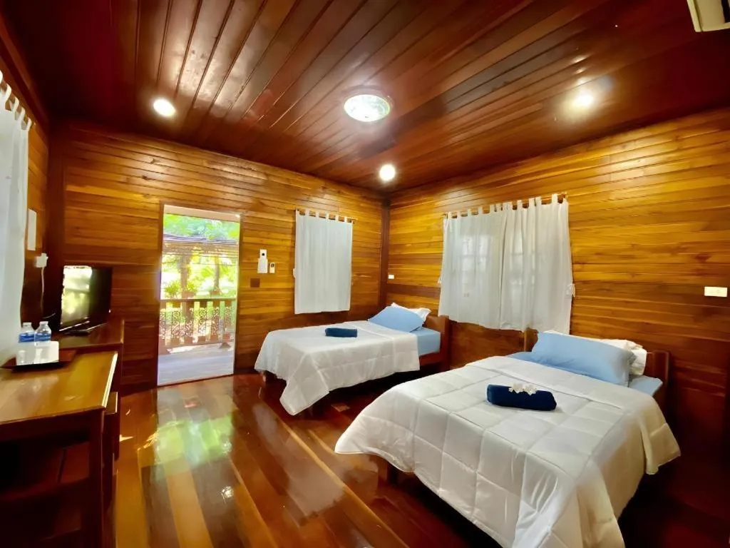 Bed in Phuphan Park Hotel