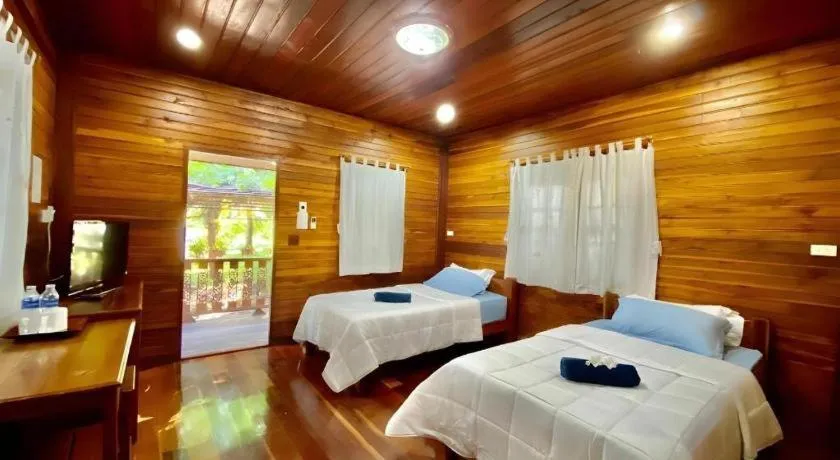 Bed in Phuphan Park Hotel