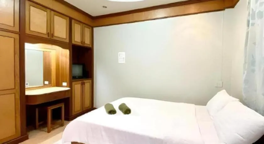 Bed in Phuphan Park Hotel