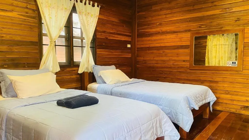 Bed in Phuphan Park Hotel