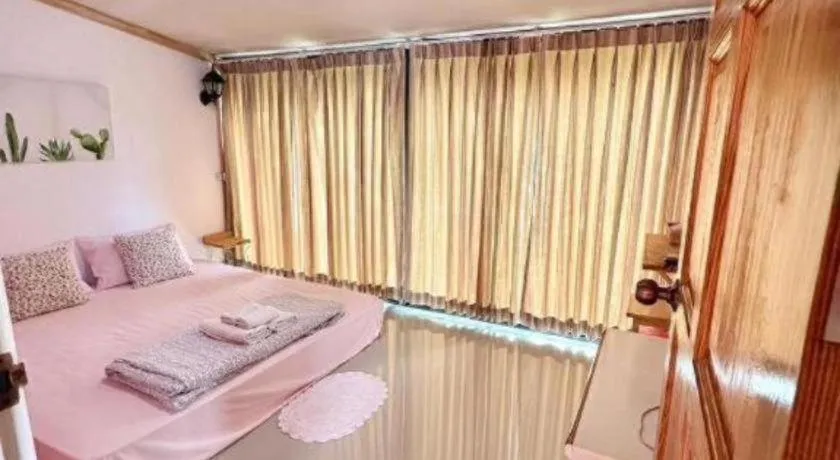 Bed in The Color Resort Amphawa