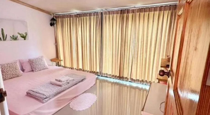 Bed in The Color Resort Amphawa