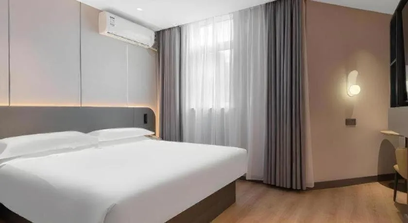 Bed in Jinjiang Inn Quanzhou West Street Kaiyuan Temple