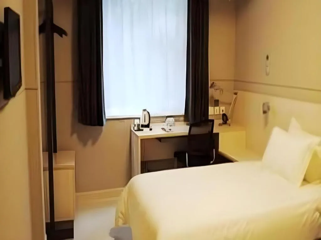 Bed in Jinjiang Inn Cixi Intime City Shanglinfang Pedestrian Street