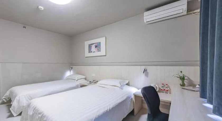 Bed in Jinjiang Inn Cixi Intime City Shanglinfang Pedestrian Street